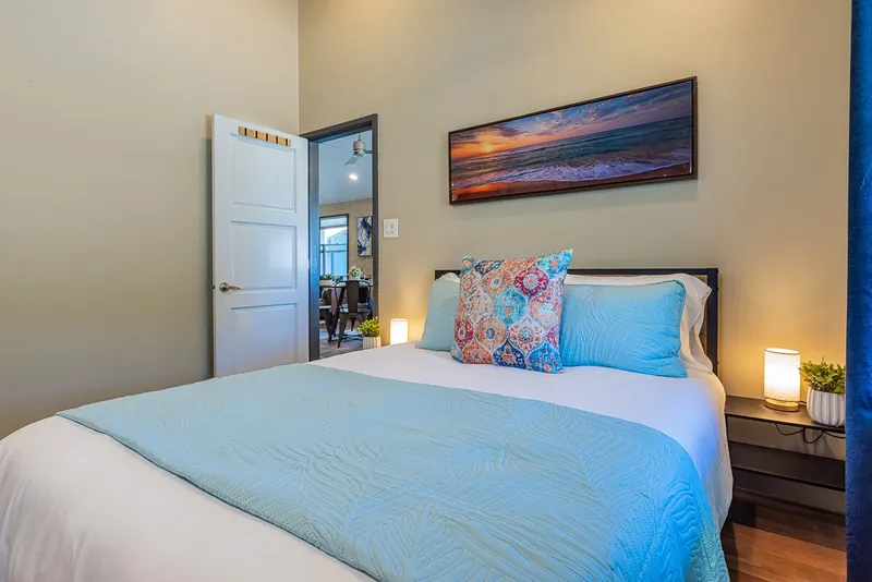 Primary bedroom w/Queen bed — Historic 2BR Condo, Wailuku