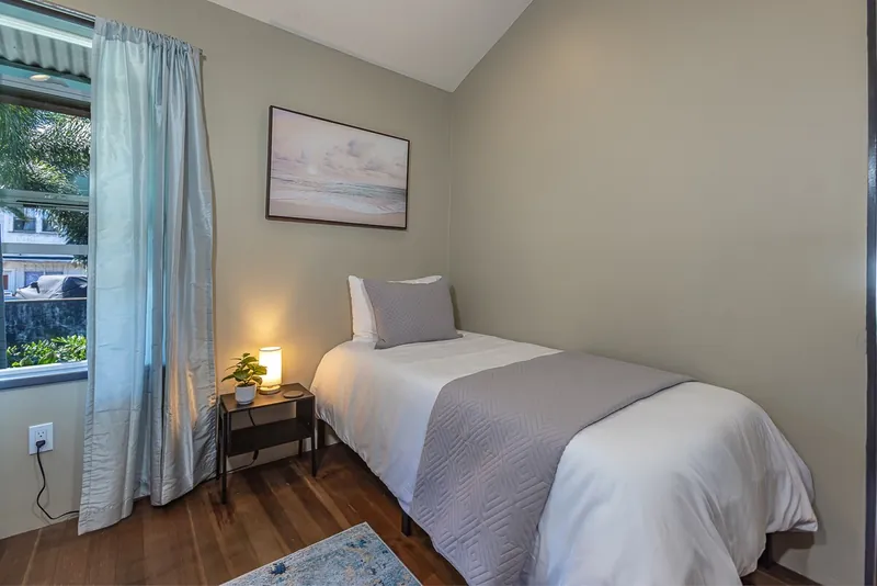 Bedrooms Feature High Celings — Historic 2BR Condo, Wailuku