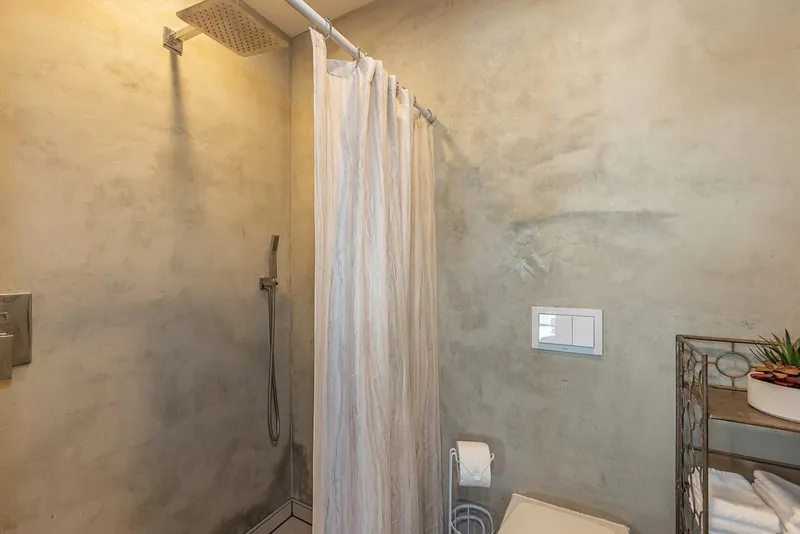 Open Shower with Rain Shower Head — Historic 2BR Condo, Wailuku