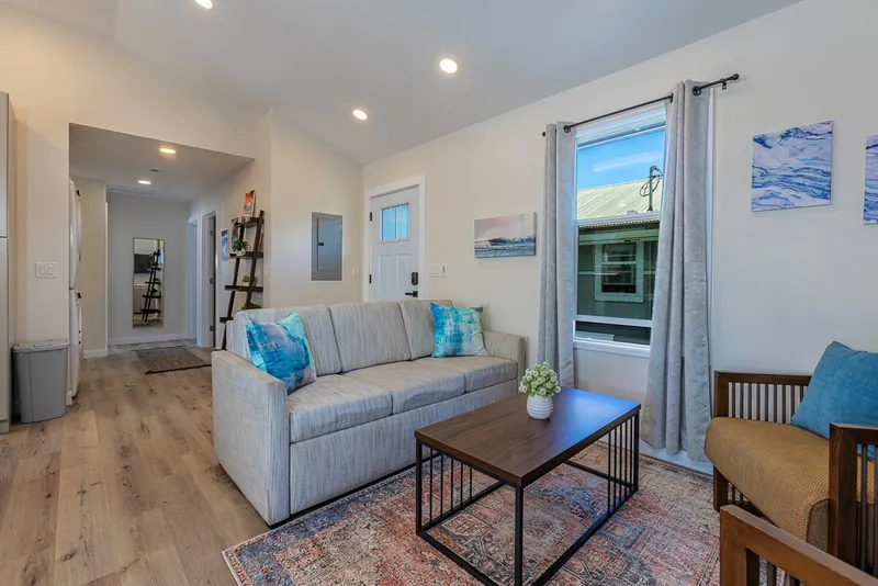 Sleeper Sofa Allows for Sleeping of Up to 8 Guests — Modern 3BR Home, Wailuku
